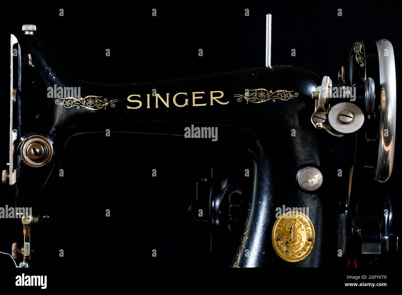 Singer 99k vintage sewing machine. Classic portable sewing machine close up. Stock Photo