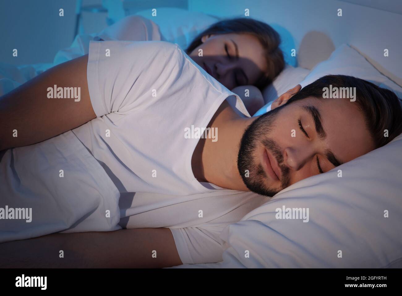 Young Cute Couple Sleeping Together In Bed Stock Photo Alamy Young Cute Couple Sleeping Together In Bed 2GFYRTH