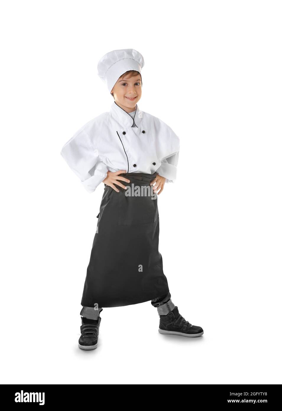 Cute boy in chef uniform on white background Stock Photo Alamy