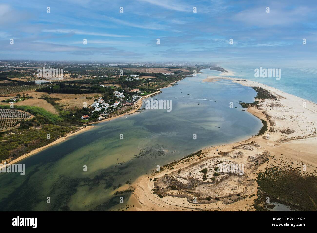 Aerial view of Praia da Fabrica, also known as Praia de Cacela Velha beach, a sandy barrier island at the mouth of the Ria Formosa in the Algarve regi Stock Photo
