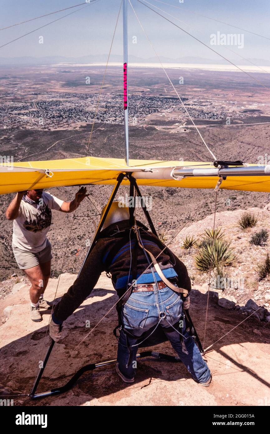 A hang glider pilot prepares to take off from the launch ramp on Horse ...