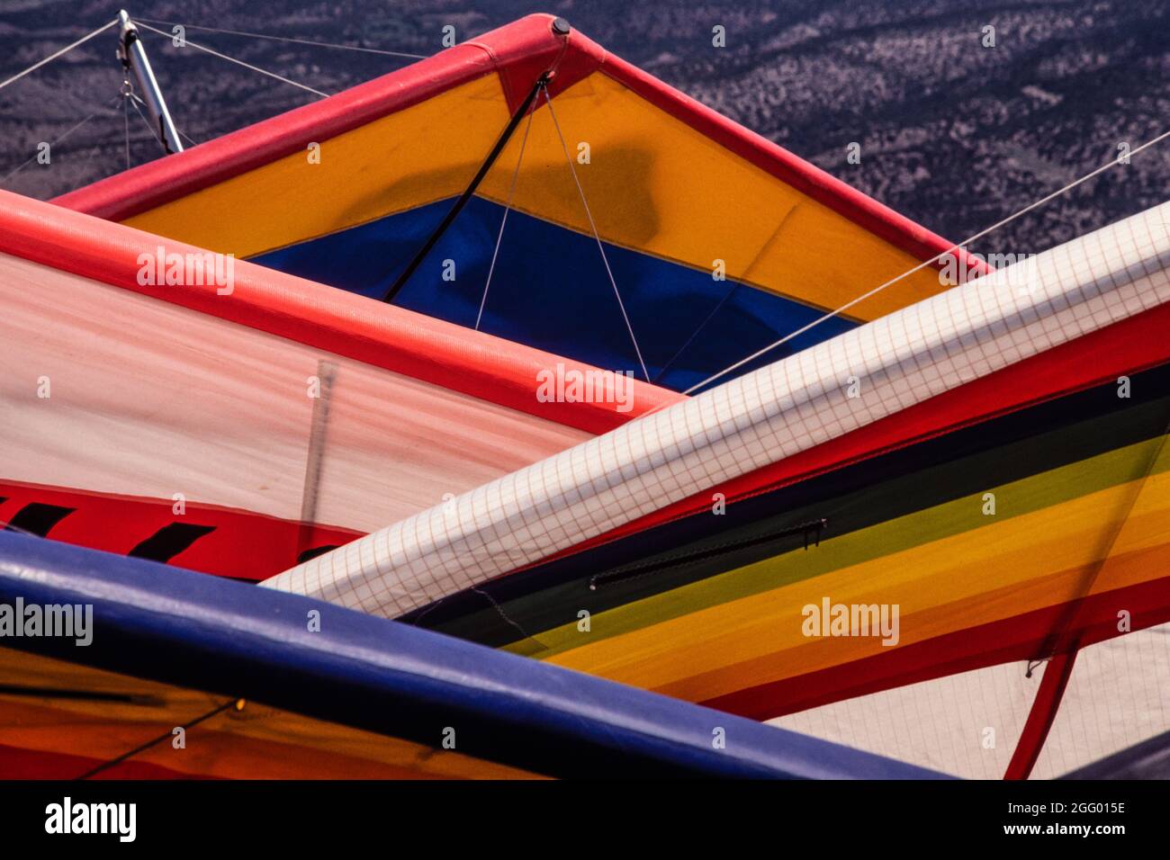 Geometric forms of hang gliders waiting to launch in New Mexico Stock