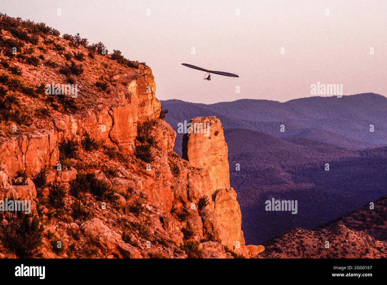 A hang glider flies along Horse Ridge at Dry Canyon near Alamogordo