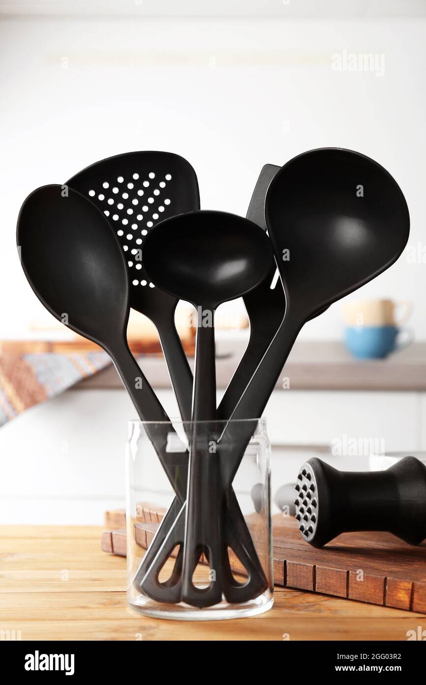 Black cooking utensils at kitchen Stock Photo Alamy