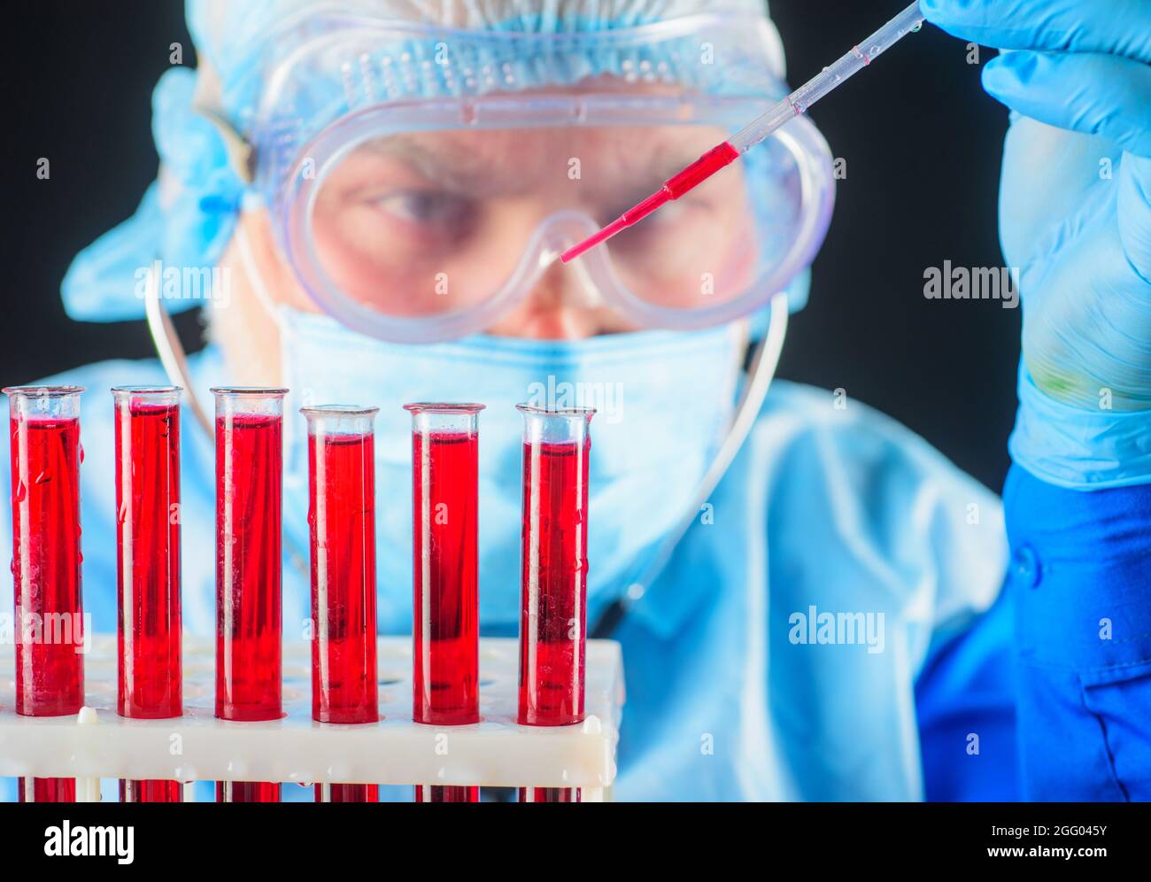 Blood research. Doctor works with blood sample. Blood test in laboratory. Medical equipment. Closeup. Stock Photo