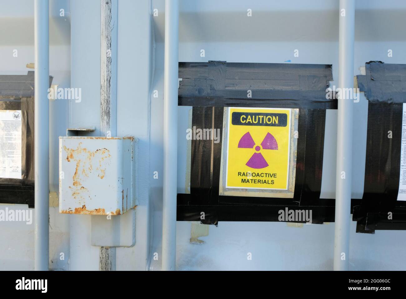 A yellow caution sign warning of radioactive materials contained inside
