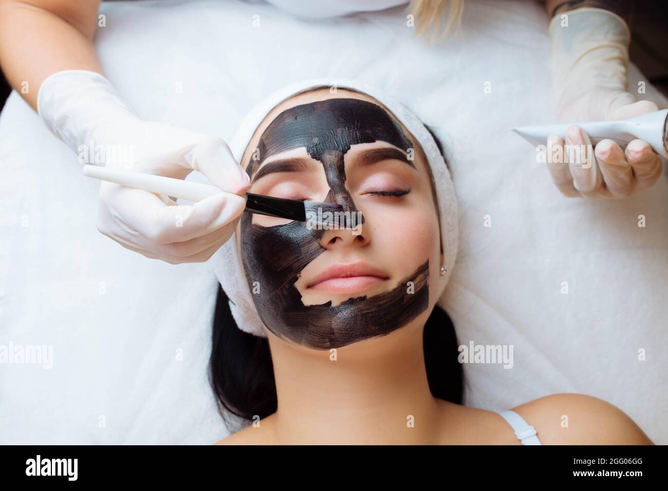 Woman remove mask cosmetic hi-res stock photography and images - Alamy