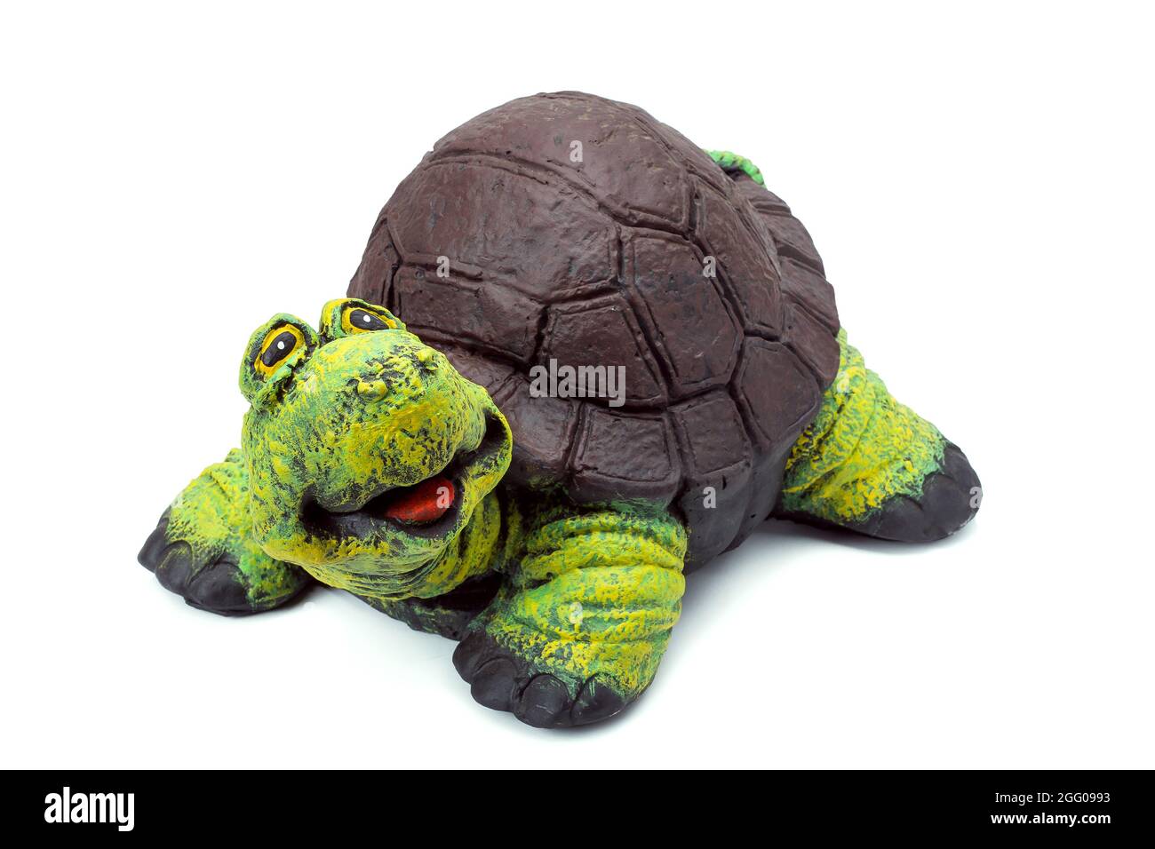 Concrete garden figure painted with colored paints, landscape object in the form of a cheerful turtle with a brown shell and a green head isolated on Stock Photo