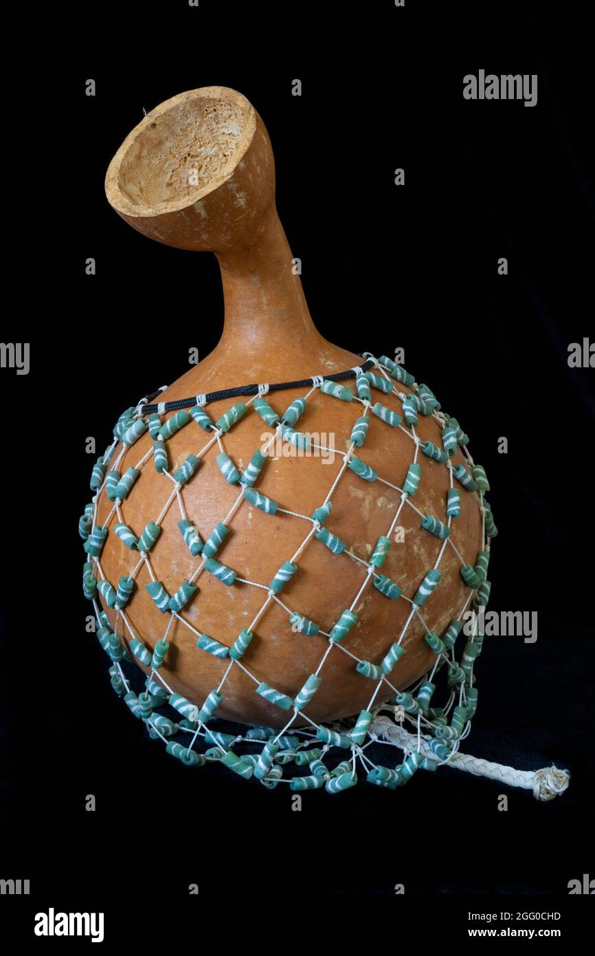 African Musical Percussion Instrument, Gourd with Beads.  Niamey, Niger. Stock Photo