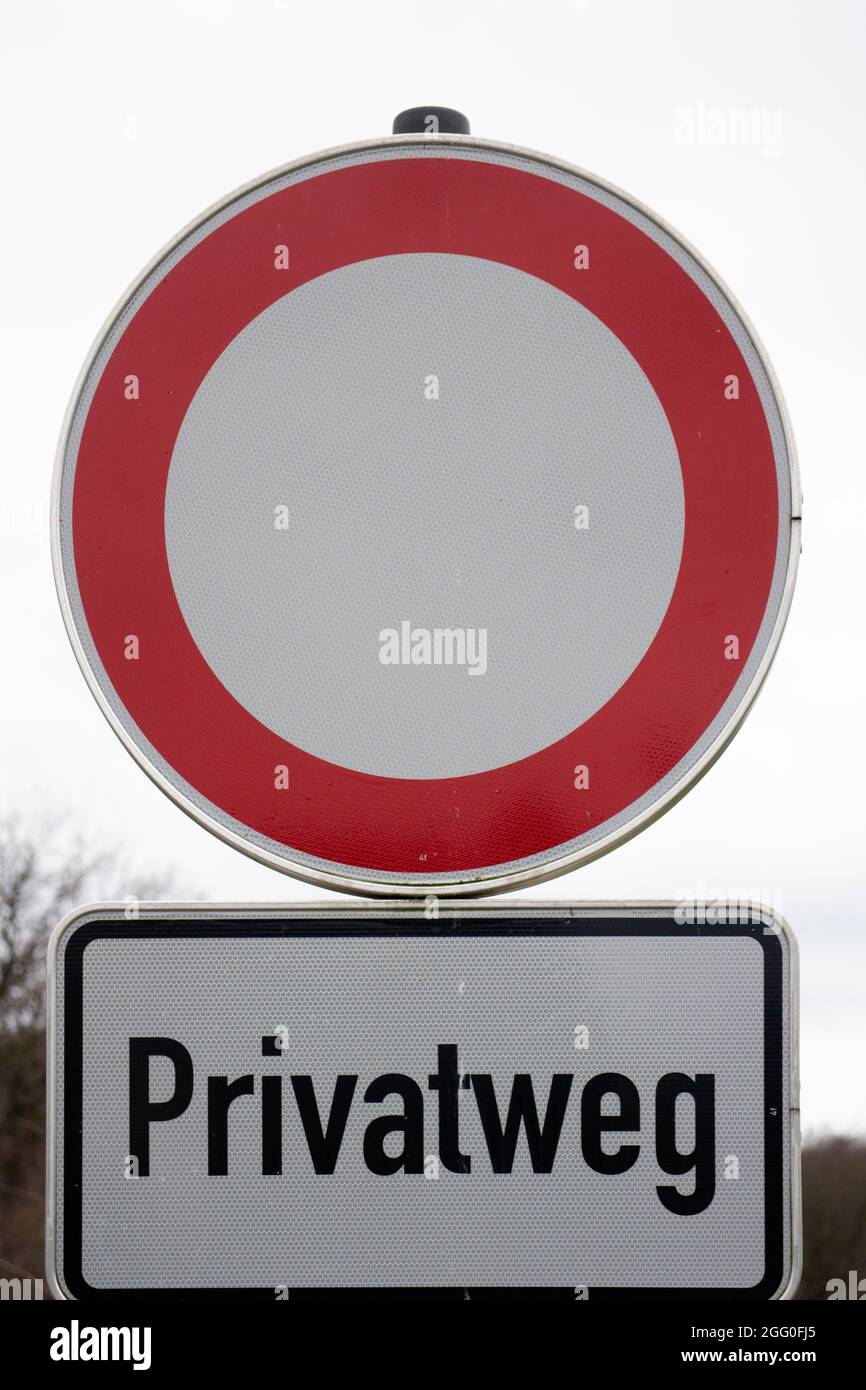 German road sign to stop because private road ahead Stock Photo