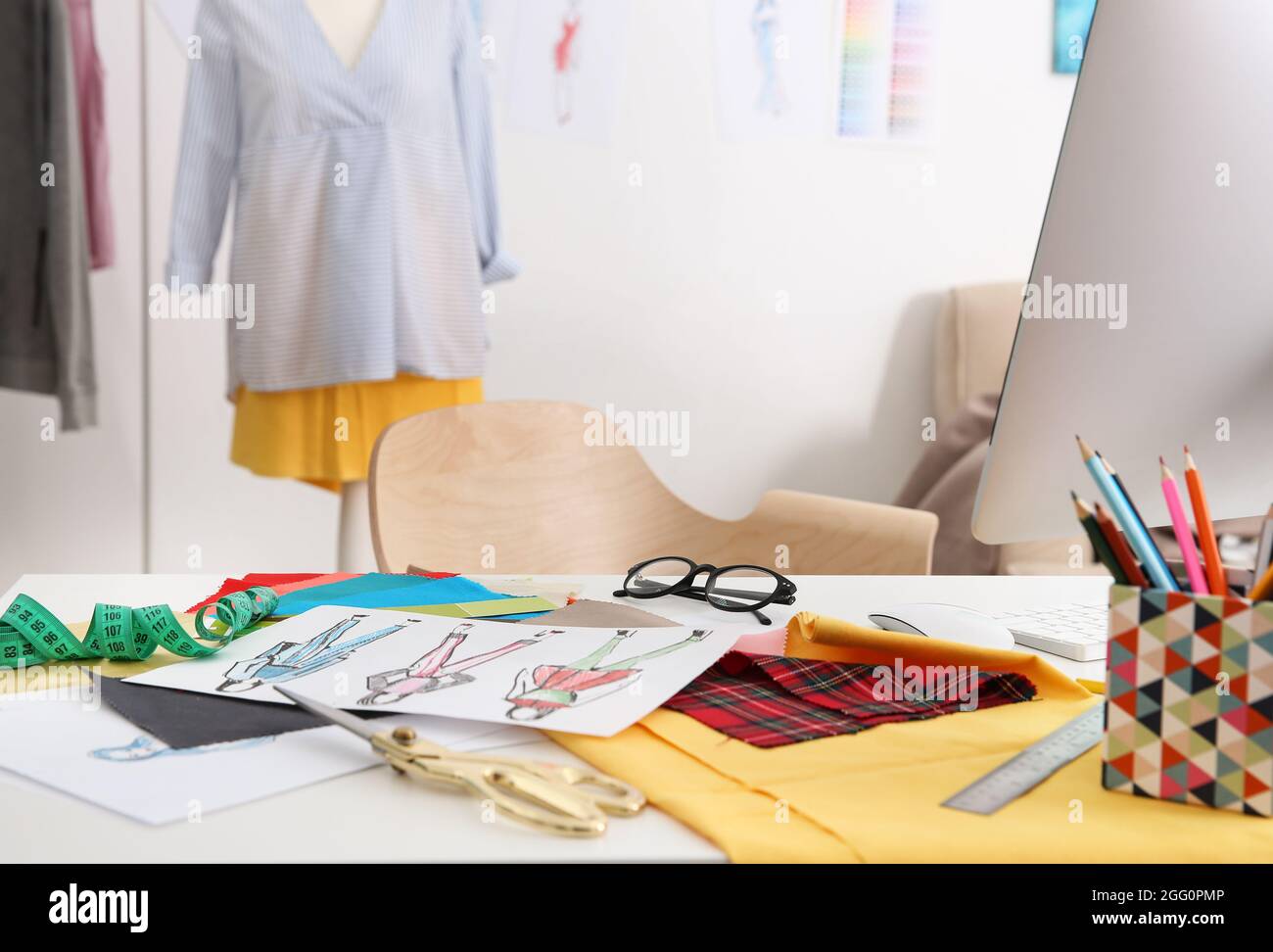 Modern interior of fashion designer workplace Stock Photo Alamy