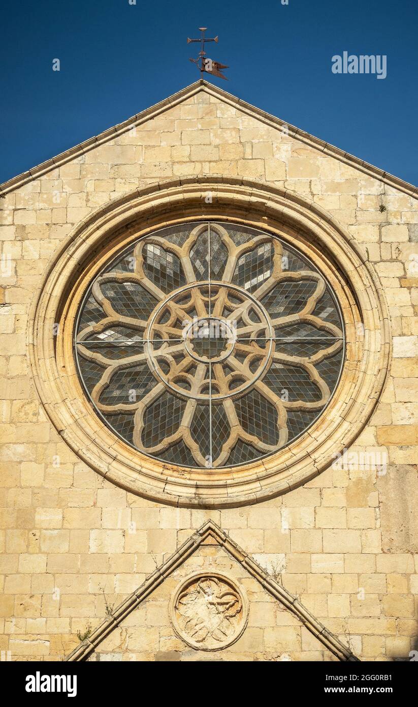 Twelve-leaf rosette on the main facade of the Church of Santa Maria do Olival in Tomar, Portugal. Stock Photo