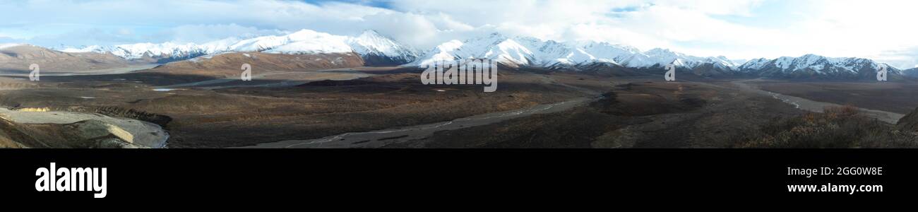 Polychrome Pass panorama in the early fall as snow works its way down the mountains Stock Photo