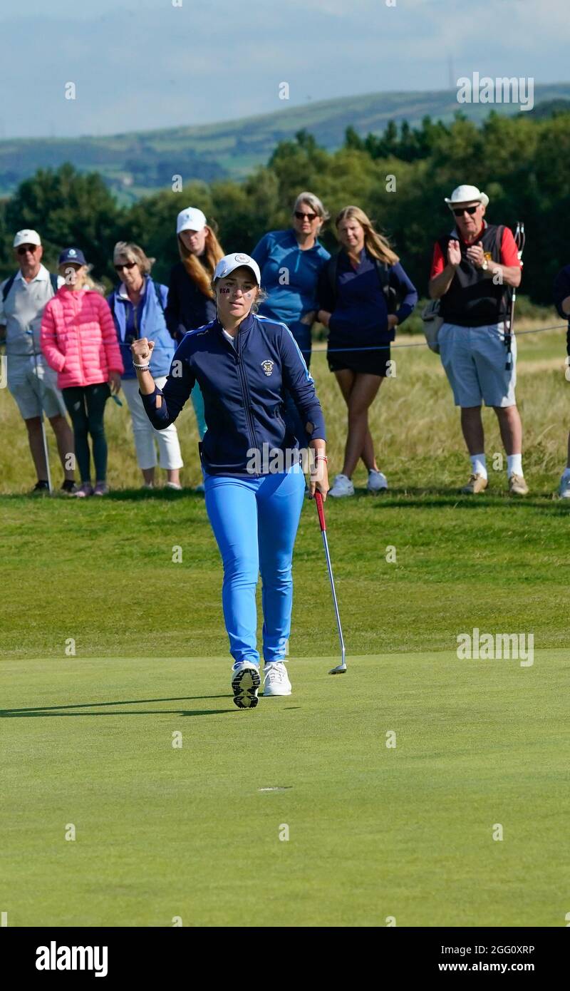Team USA's Rachel Kuehn celebrates holing a putt on the 5th green