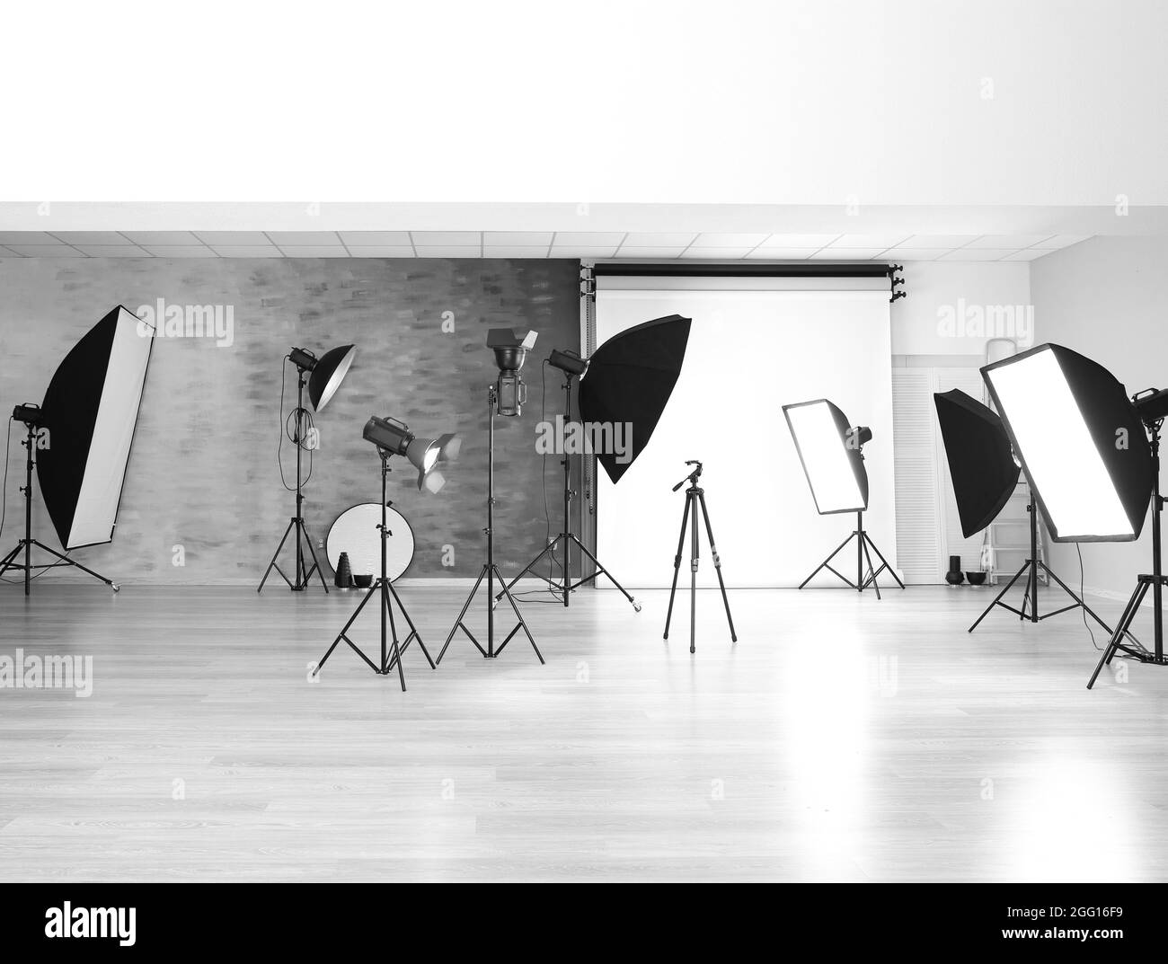 Empty photo studio with lighting equipment Stock Photo - Alamy
