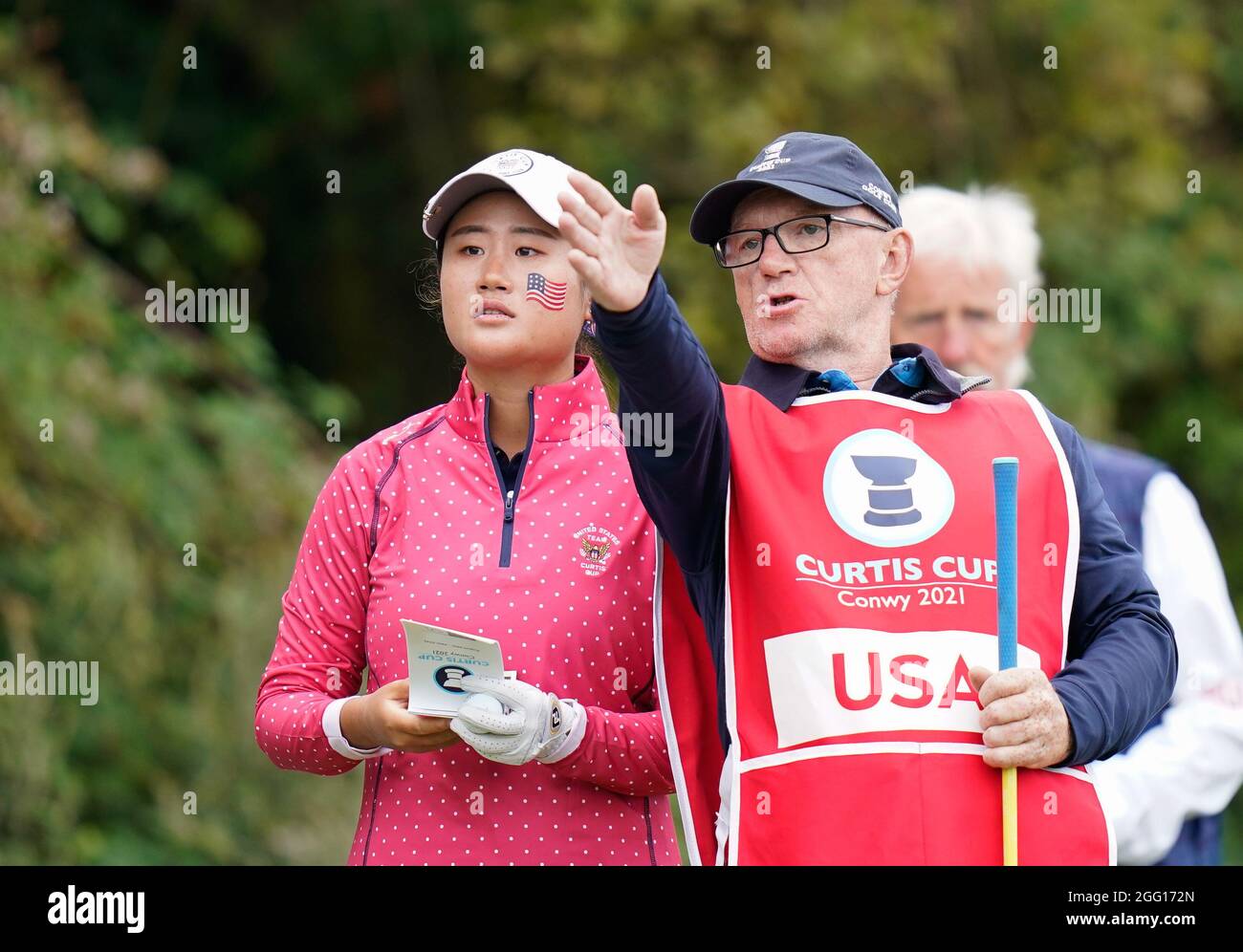 Team USA's Gina Kim and her caddie pick. A target to aim for on the 6th