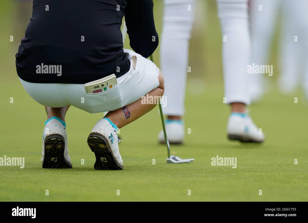 Team GB&I's Emily Toy lines up a putt during the 2021 Curtis Cup Day 1 - Morning Foursomes at Conwy Golf Club, Conwy, Wales on 26/8/21 . (Steve Flynn/ Stock Photo