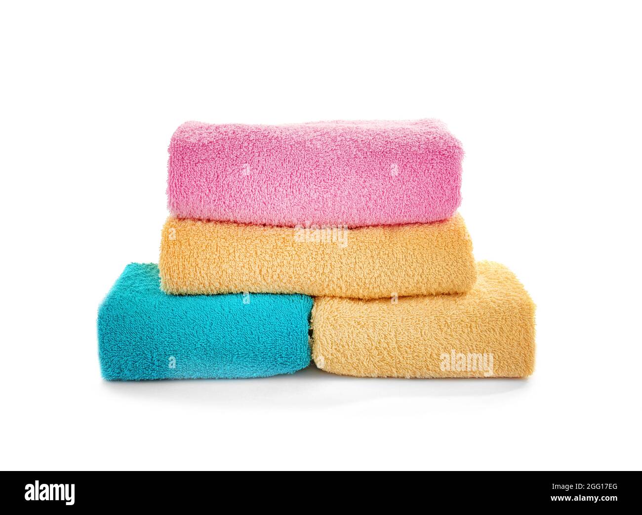Pile of towels isolated on white Stock Photo - Alamy