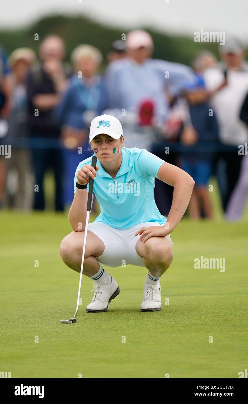 Team GB&I's Hannah Darling lines up a putt during the 2021 Curtis Cup Day 1 - Morning Foursomes at Conwy Golf Club, Conwy, Wales on 26/8/21 . (Steve F Stock Photo