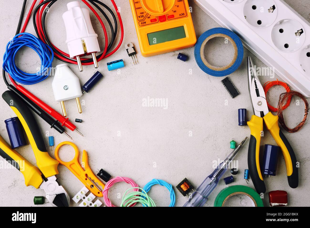 Different electrical tools on light background top view Stock Photo Different electrical tools on light background top view Stock Photo