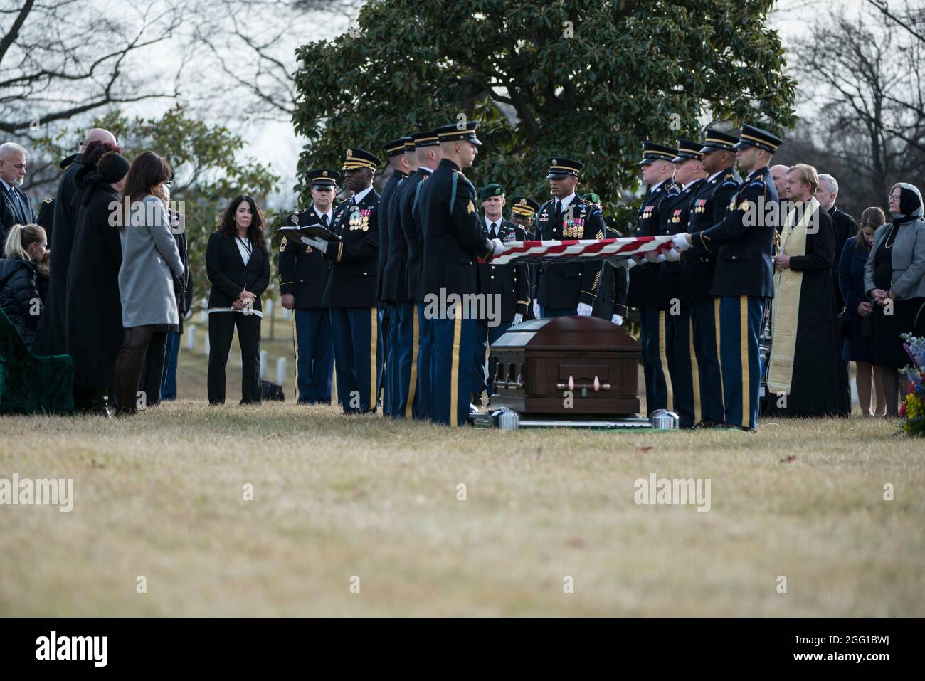 U.S. Army Chaplain Willie Mashack (Maj.) gives remarks during the service of U.S. Army Sgt. 1st Class Mihail Golin, in Section 60 of Arlington National Cemetery,  Arlington, Virginia, Jan. 22, 2018. Golin, an 18B Special Forces Weapons Sergeant assigned to 10th Special Forces Group (Airborne) died Jan. 1, 2018, as a result of wounds sustained while engaged in combat operations in Nangarhar Province, Afghanistan.  Golin deployed to Afghanistan in September 2017 with the 2nd Battalion, 10th Special Forces Group, in support of Operation Freedom’s Sentinel.  Golin enlisted Jan. 5, 2005 and this wa Stock Photo