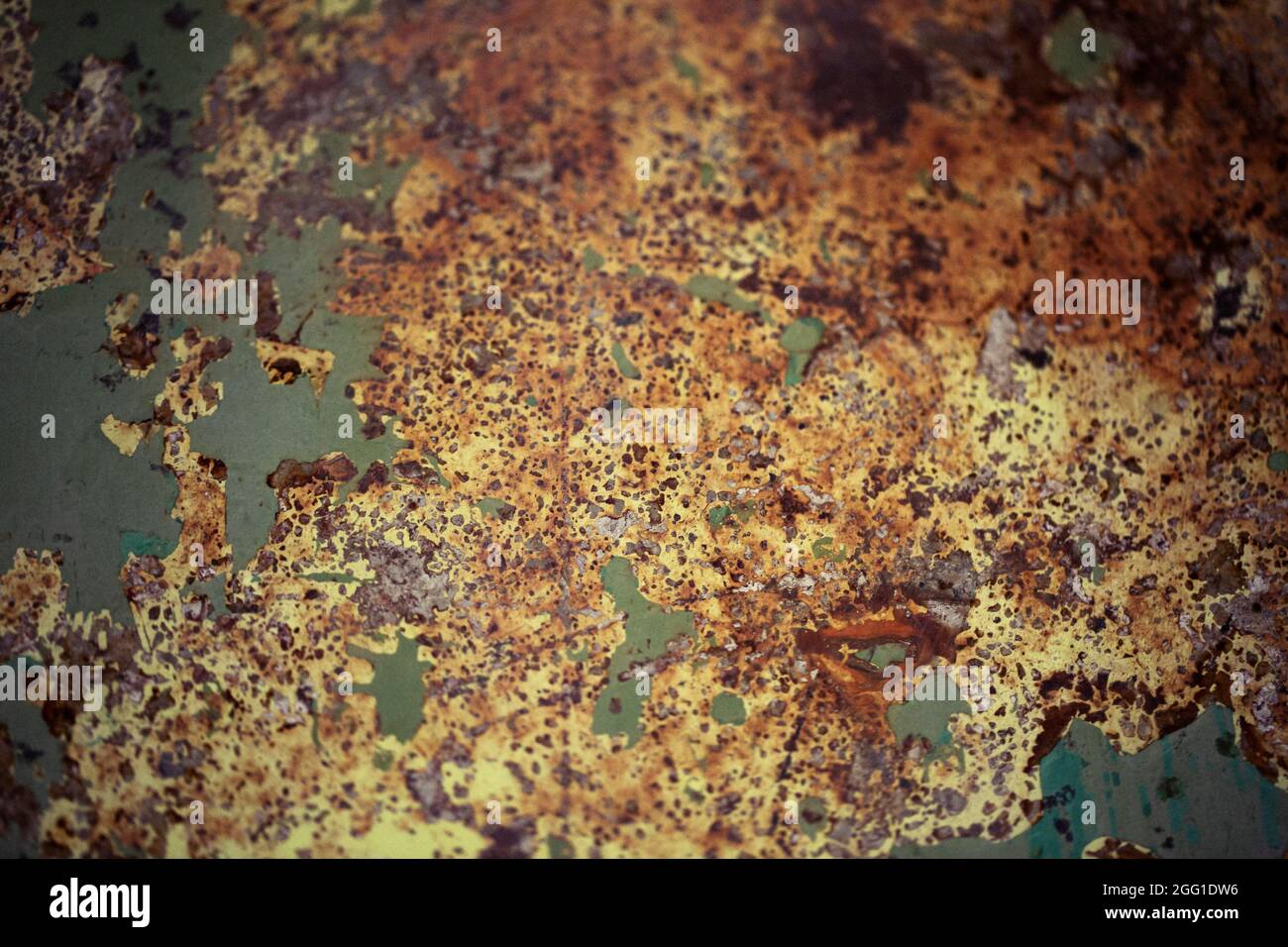 Rusty weathered green and brown background Stock Photo
