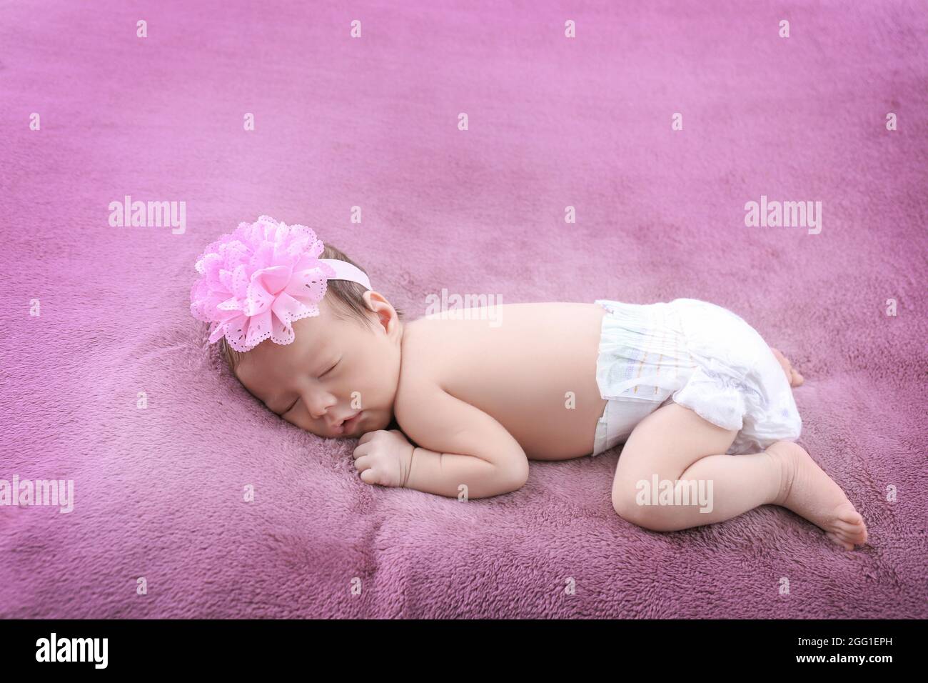 Cute little baby sleeping on bed at home Stock Photo Alamy
