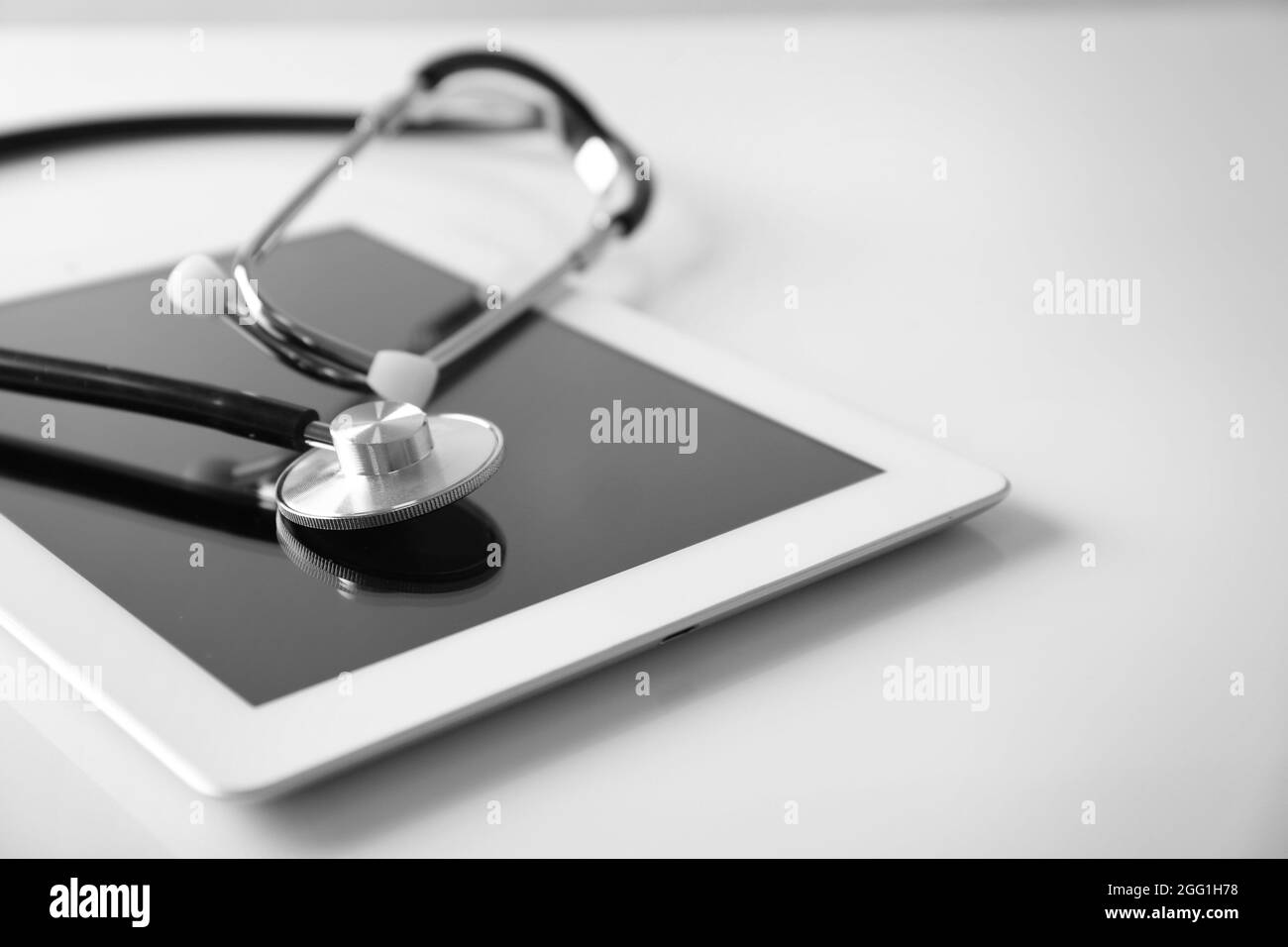 Stethoscope and tablet pc on white background Stock Photo - Alamy