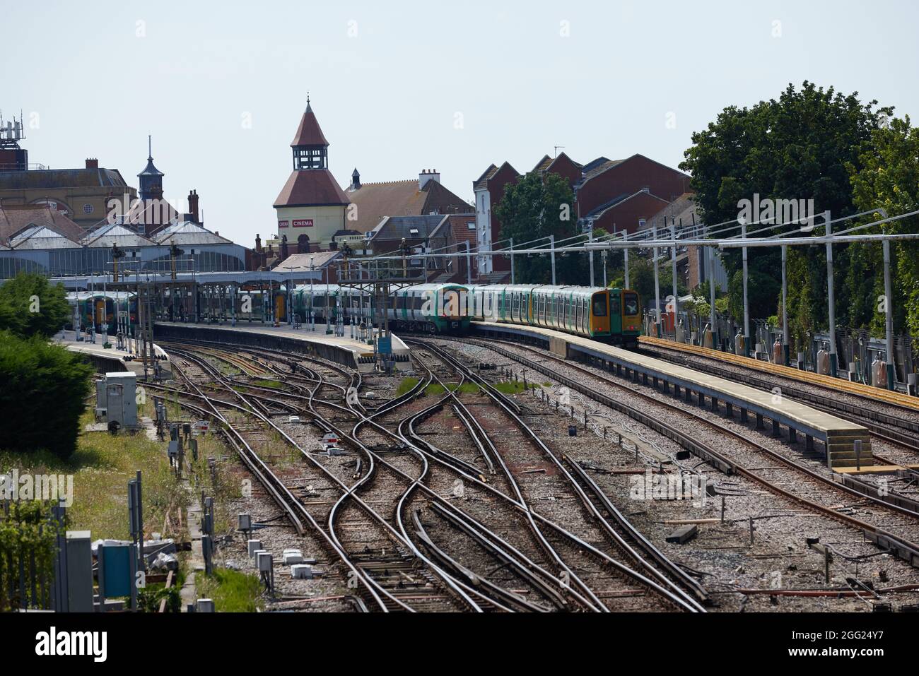 Bognor Regis railway station with tracks and trains during the day in