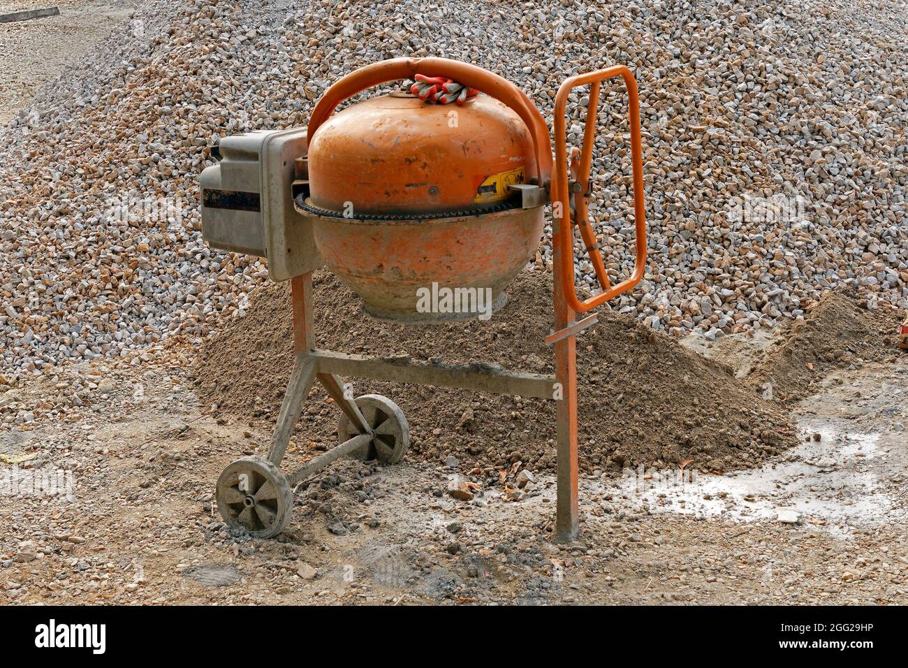 Petrol cement mixer aggregate on construction site outdoors Stock Photo