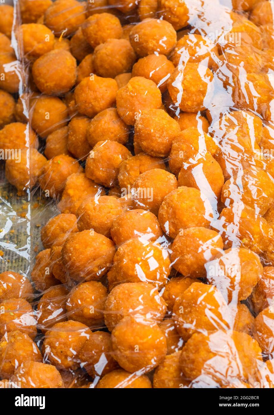 Delicious indian dry sweet rasgulla selling in the street close Stock ...