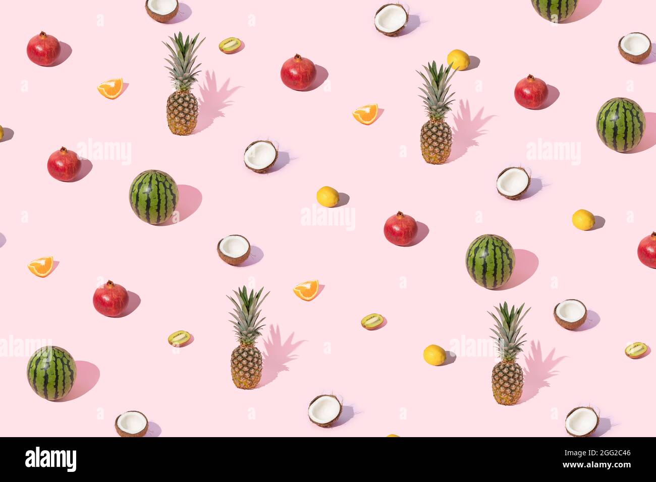 Tropical Summer Concept Of Fruit Pattern Made Of Pomegranate Lemon Pineapple Orange Kiwi Watermelon On Pastel Pink Background Trendy Colorful La Stock Photo Alamy