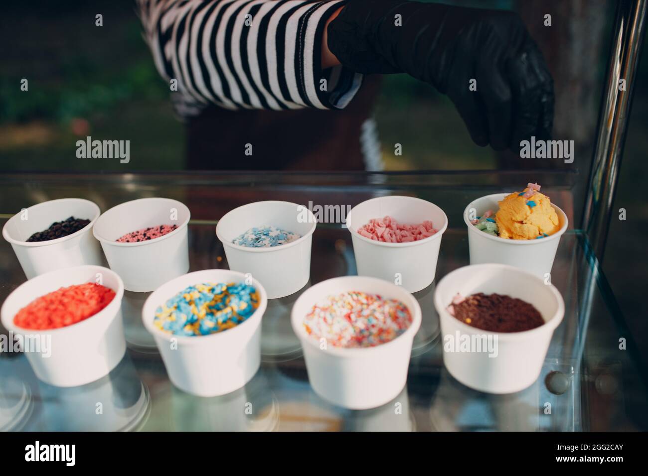 Topping different tastes for frozen yogurt or ice cream Stock Photo Alamy