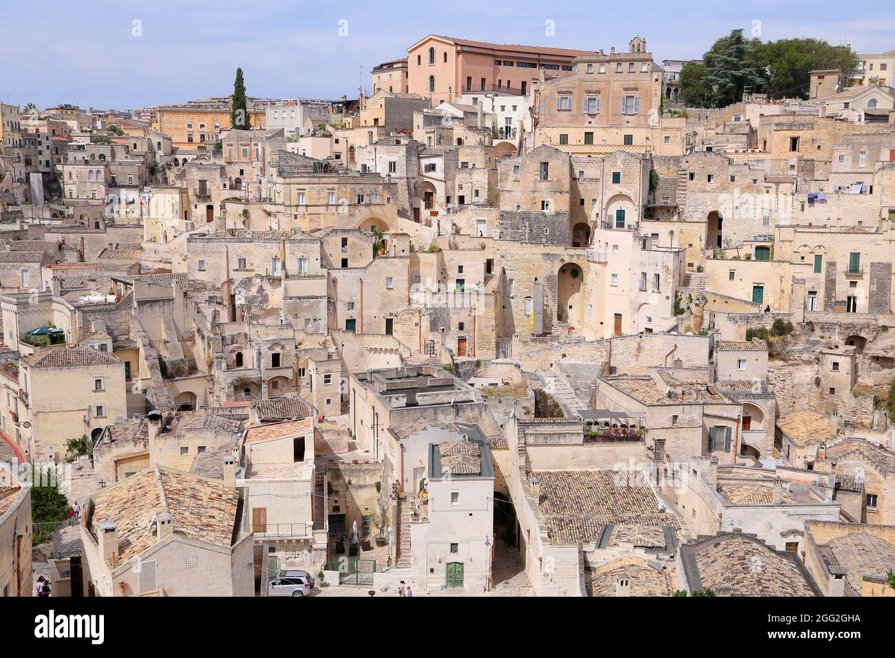 Matera, Italy - August 18, 2020: View of the Sassi di Matera a historic district in the city of Matera, well-known for their ancient cave dwellings. B Stock Photo