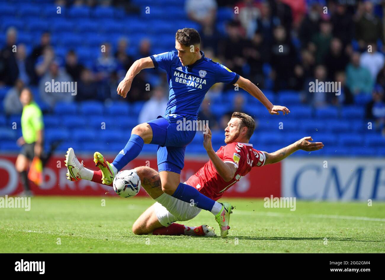 Cardiff City's Ryan Giles (left) and Bristol City's Tomas Kalas battle for the ball during the Sky Bet Championship match at the Cardiff City Stadium, Cardiff. Picture date: Saturday August 28, 2021. Stock Photo