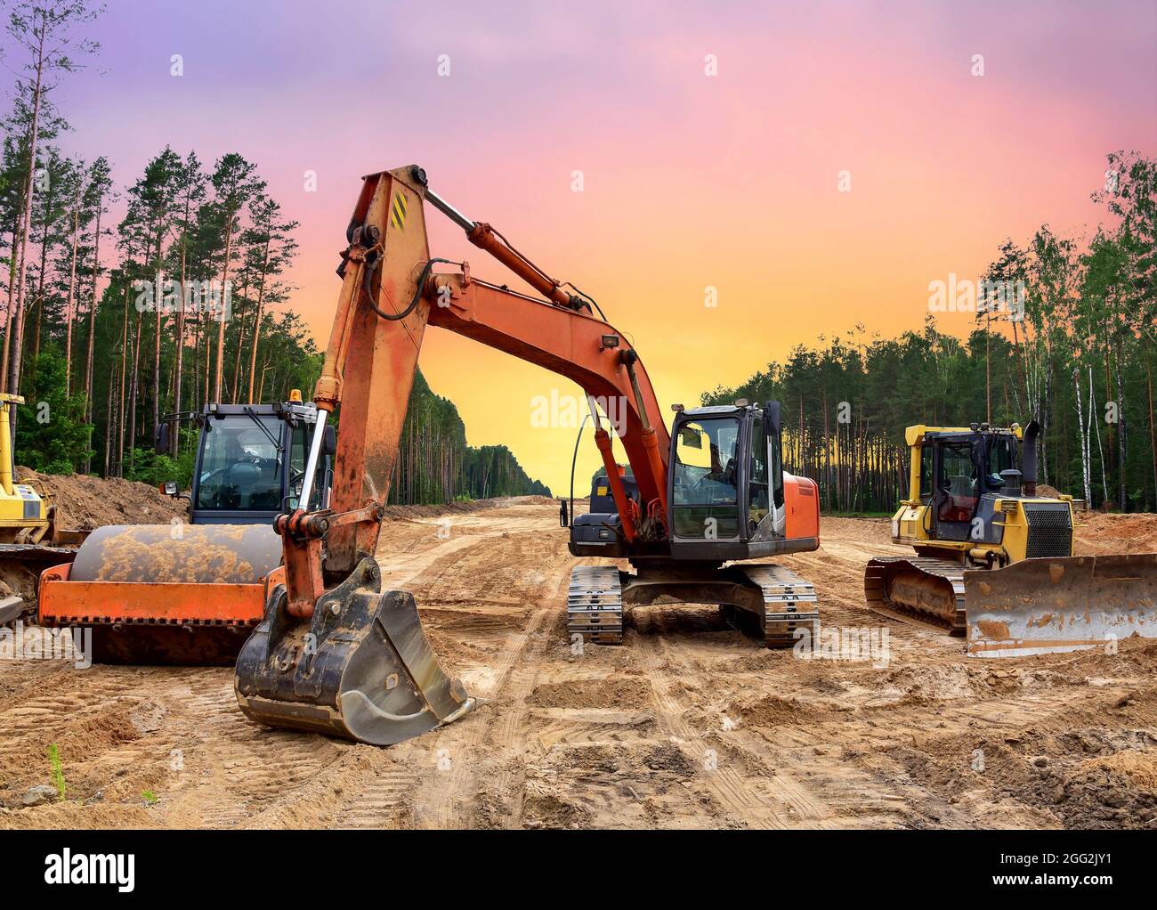 Bulldozer, Excavator and Soil compactor on road work. Earthmoving heavy equipment and
