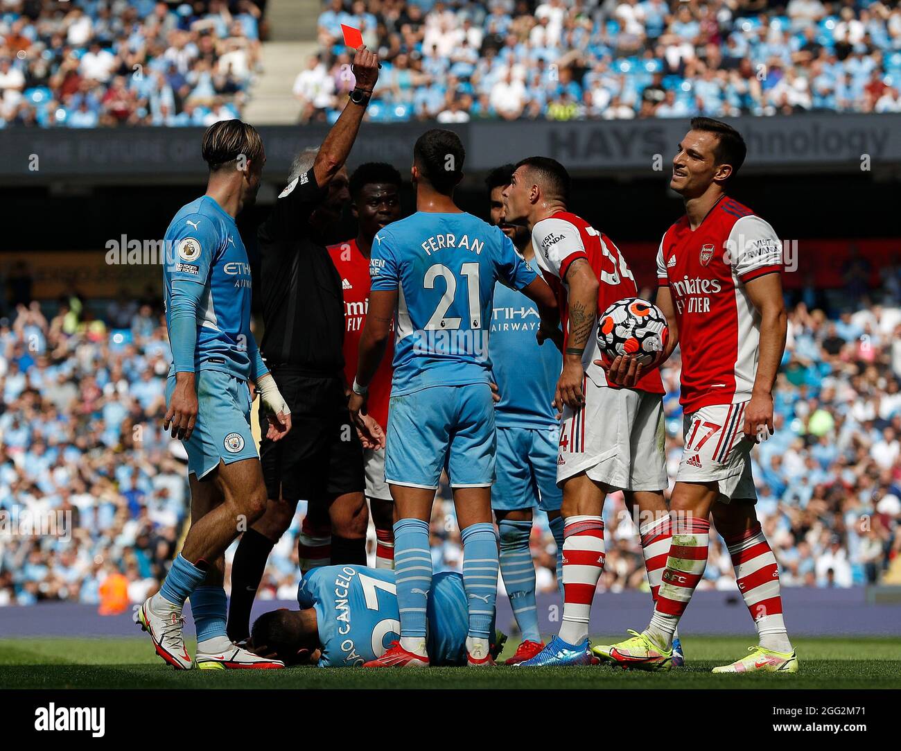 Manchester, England, 28th August 2021.  Granit Xhaka of Arsenal is shown a red card during the Premier League match at the Etihad Stadium, Manchester. Picture credit should read: Darren Staples / Sportimage Credit: Sportimage/Alamy Live News Credit: Sportimage/Alamy Live News Stock Photo