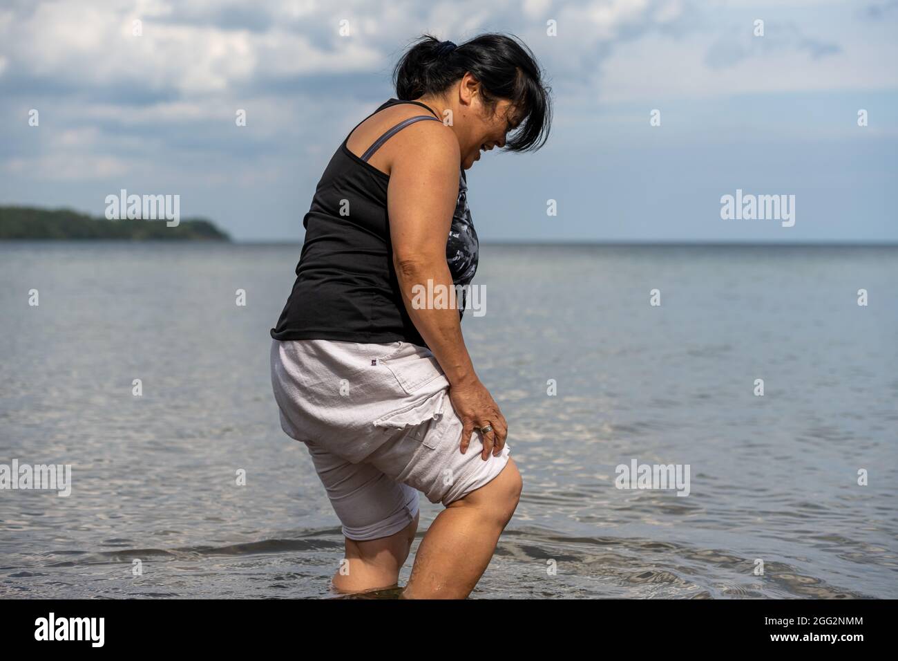 Happy 60s asian aged hi-res stock photography and images - Alamy