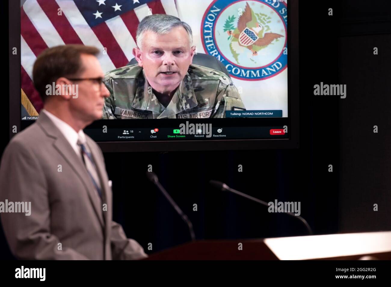 Pentagon Press Secretary John Kirby and Air Force Gen. Glen D. VanHerck, commander, U.S. Northern Command and North American Aerospace Defense Command (virtual participation), brief the media in the Pentagon Briefing Room, Washington, D.C., Aug. 27, 2021. (DoD photo by Lisa Ferdinando) Stock Photo