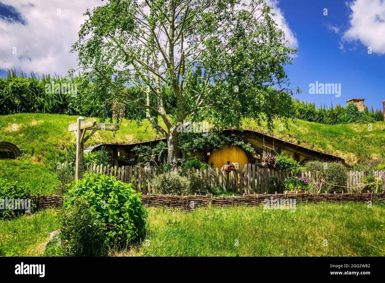 Yellow Door Hobbit Hole Home On The Hobbiton Movie Set For The Lord Of The Rings Movie Trilogy In Matamata New Zealand A Popular Tourist Attraction Stock Photo