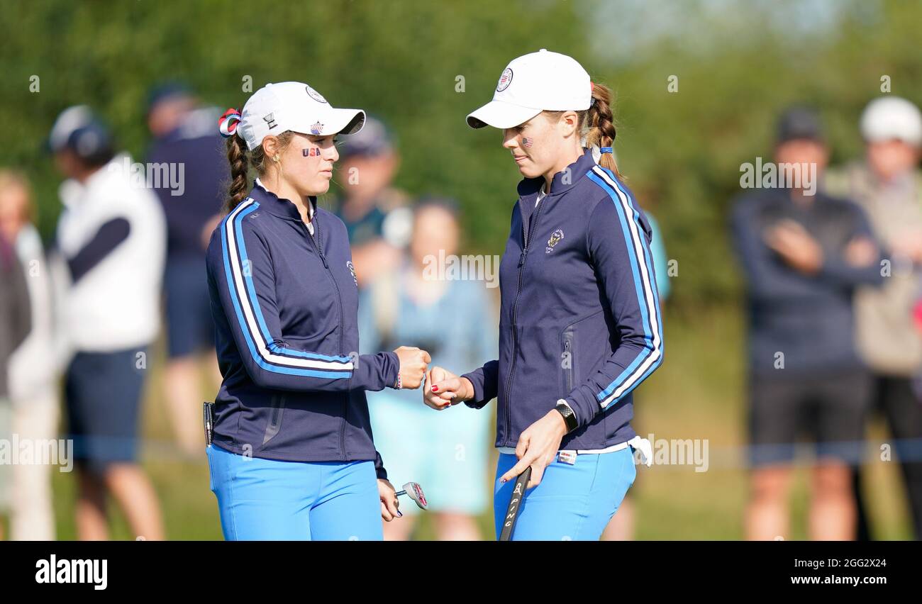 Team USA's Rachel Kuehn fist pumps with Emilia Migliaccio on the. 8th ...