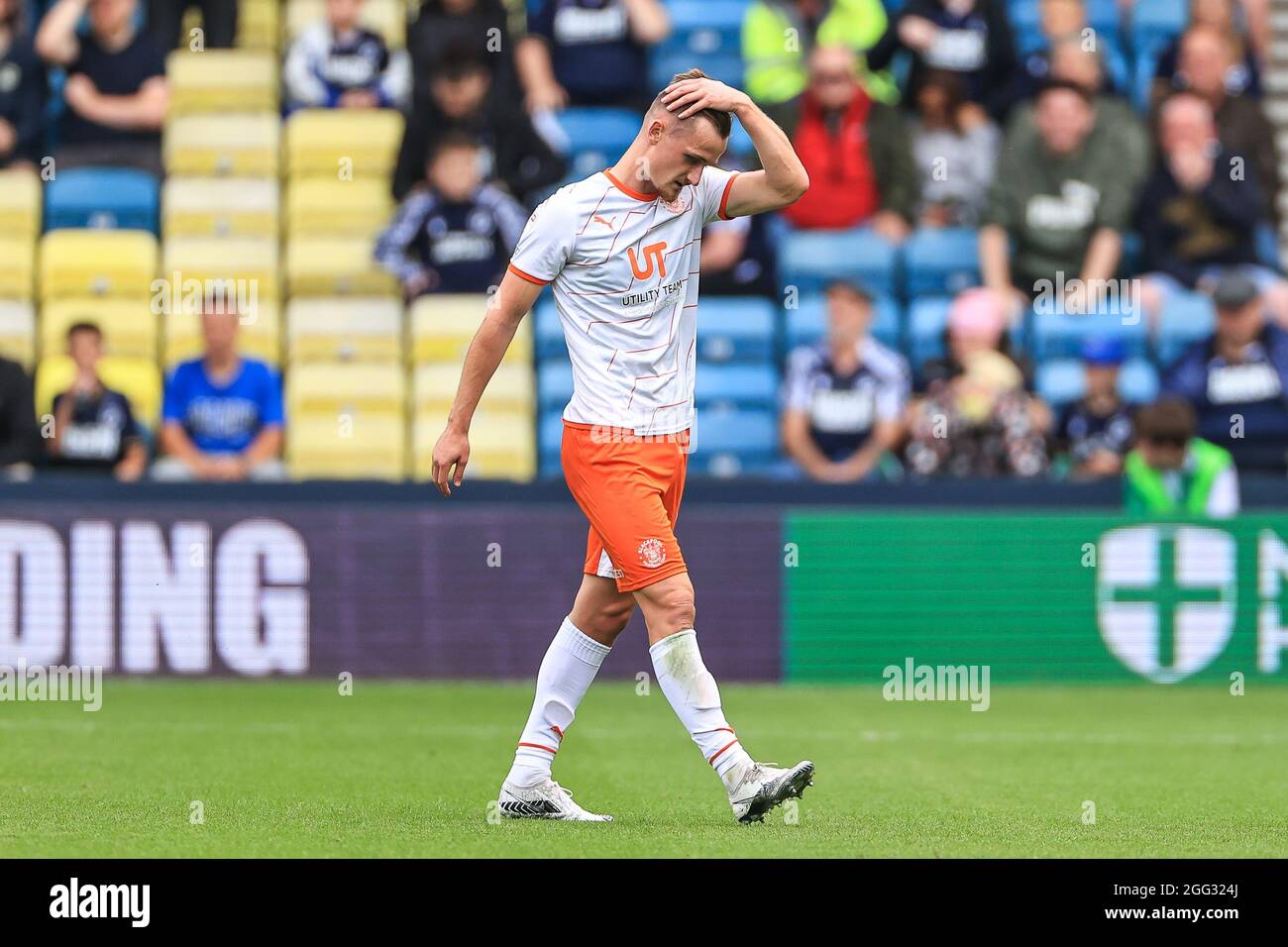 Callum Connolly #2 of Blackpool leaves the pitch after receiving a red card from Referee Gavin Ward Stock Photo