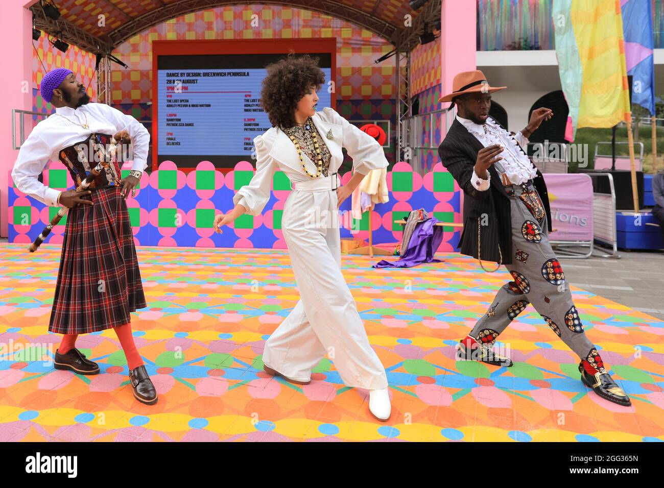 London, UK, 28th Aug 2021. Energetic performers present 'Dandyism' in flamboyant outfits as part of Patrick Ziza's flamboyant celebration of African style. The performance is one of the 'Dance by Design' series at Greenwich Peninsula, all part of Greenwich and Docklands International Festival 2021. Credit: Imageplotter/Alamy Live News Stock Photo