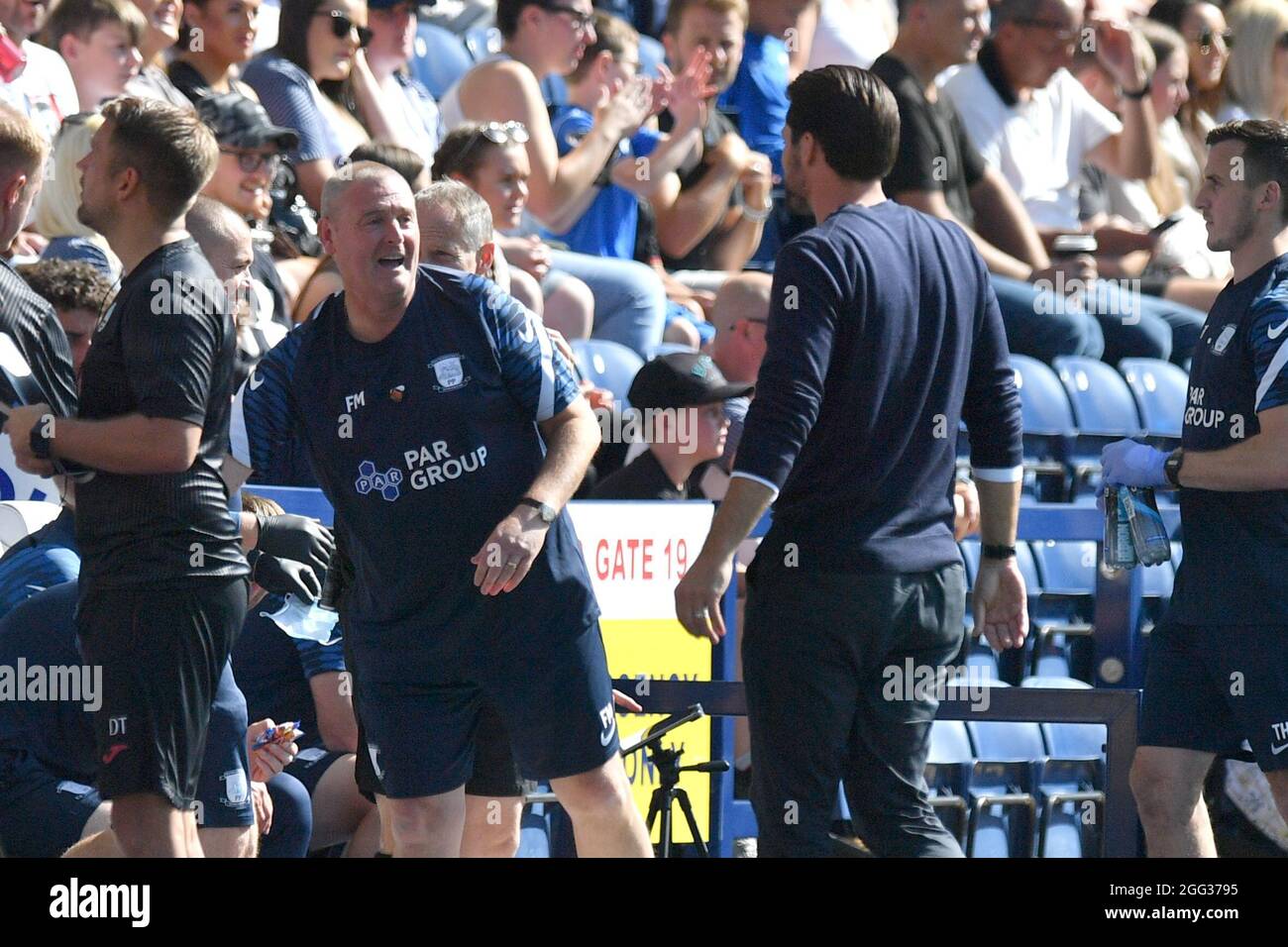Preston North End manager Frankie McAvoy greets Swansea City manager Russell Martin during the Sky Bet Championship match at the Deepdale Stadium, Preston. Picture date: Saturday August 28, 2021. Stock Photo