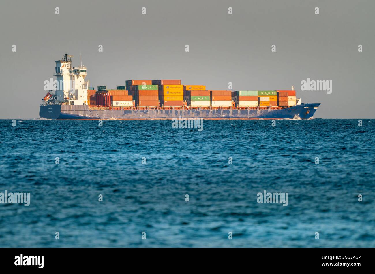 Hek, Poland - 08.01.2021: Big cargo container ship fully loaded on its way  across the Baltic sea in early morning light. Sea tranportation vessel  Stock Photo - Alamy