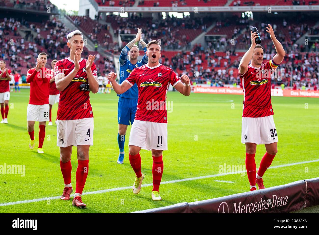 28 August 2021 Baden Wuerttemberg Stuttgart Football Bundesliga Vfb Stuttgart Sc Freiburg Matchday 3 At Mercedes Benz Arena Freiburg S Roland Sallai L R Freiburg S Nico Schlotterbeck Freiburg S Goalkeeper Mark Flekken Freiburg S Ermedin