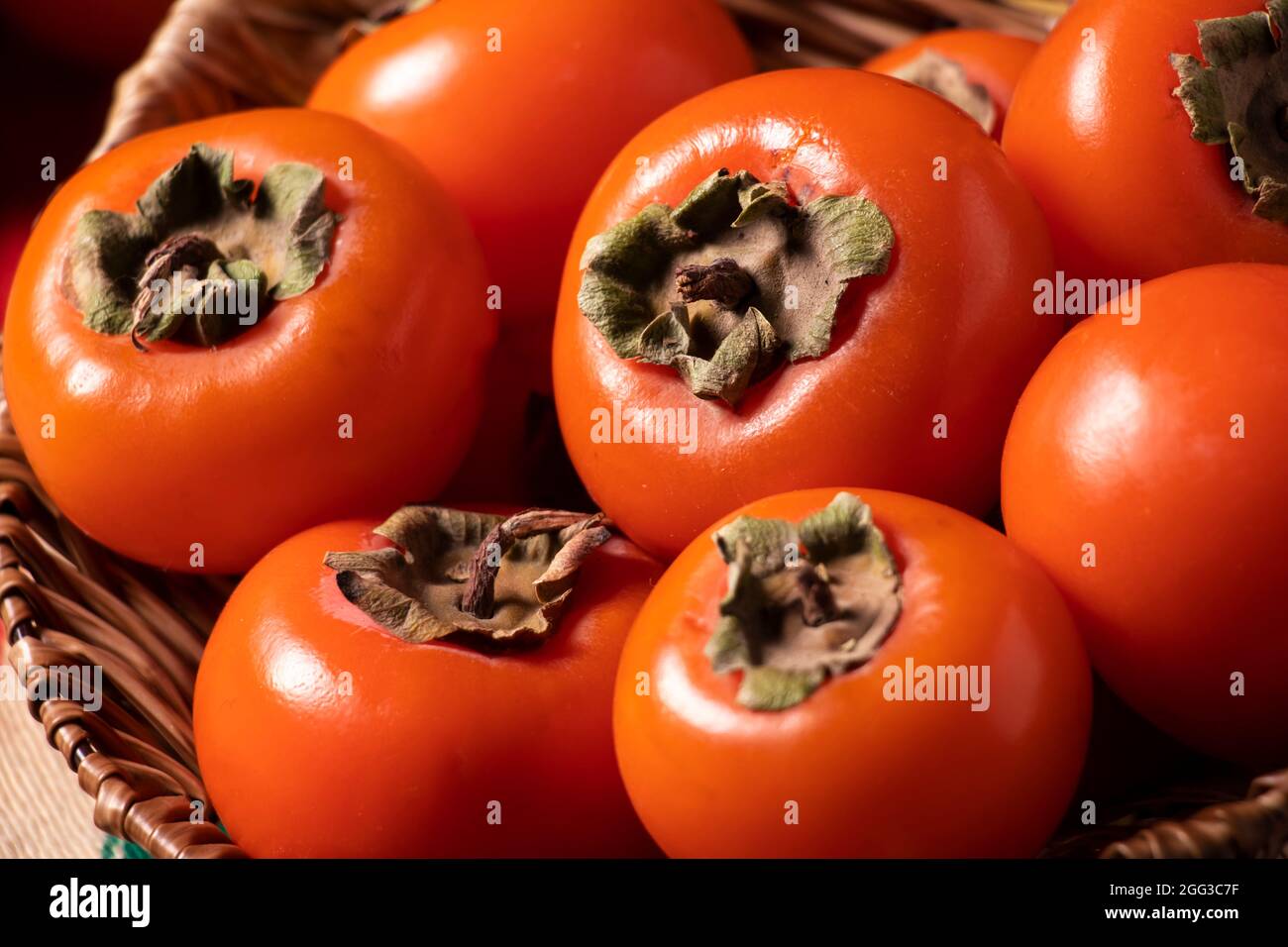 Persimmon from autumn fruits for a charming autumn evening Stock Photo