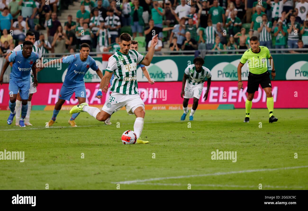 BUDAPEST, HUNGARY - AUGUST 4: Ihor Kharatin of Ferencvarosi TC scores during the UEFA Champions League Third Qualifying Round 1st Leg match between Ferencvarosi TC and SK Slavia Praha at Ferencvaros Stadium on August 4, 2021 in Budapest, Hungary. Stock Photo