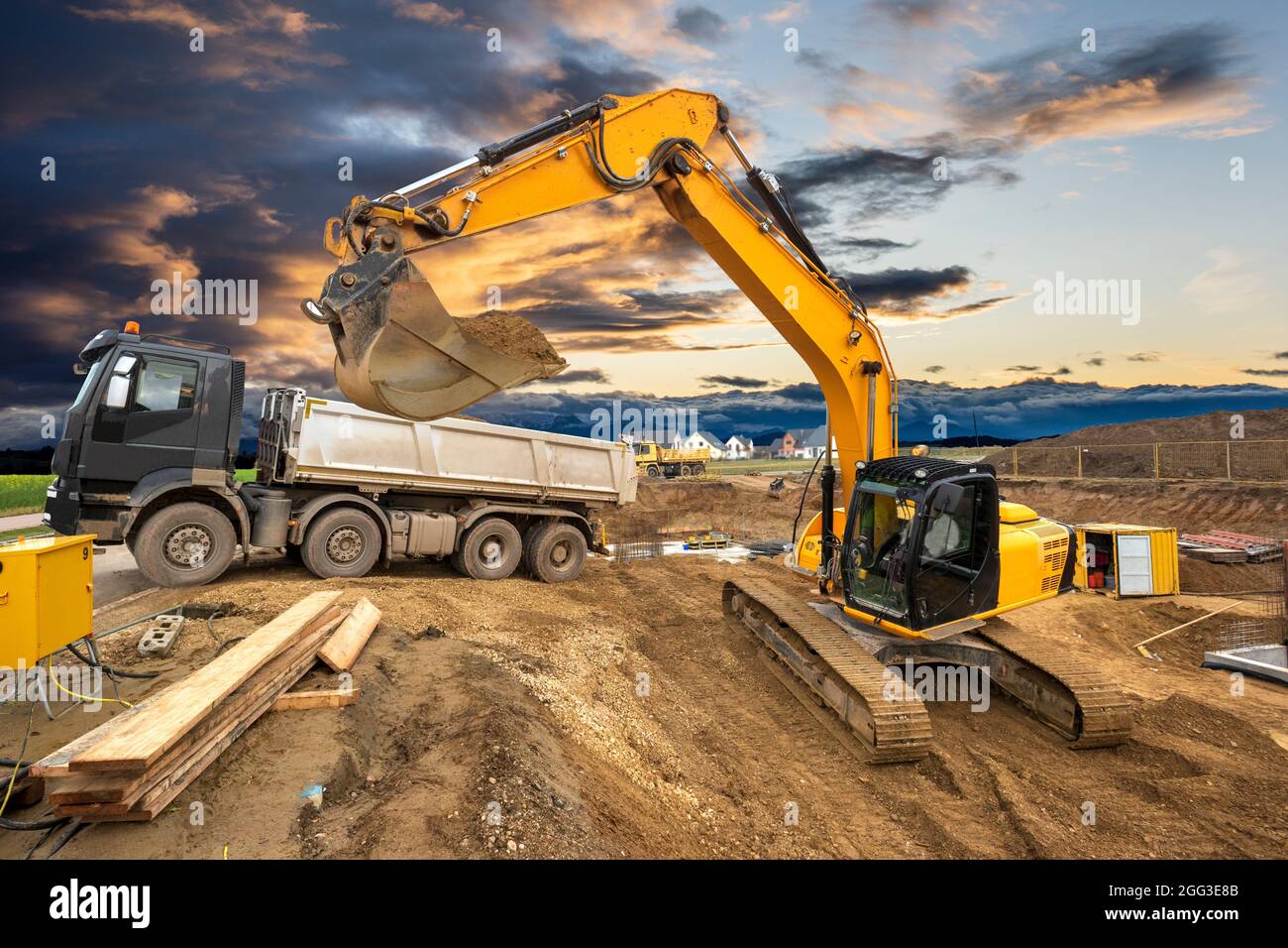 excavator at work on construction site Stock Photo - Alamy