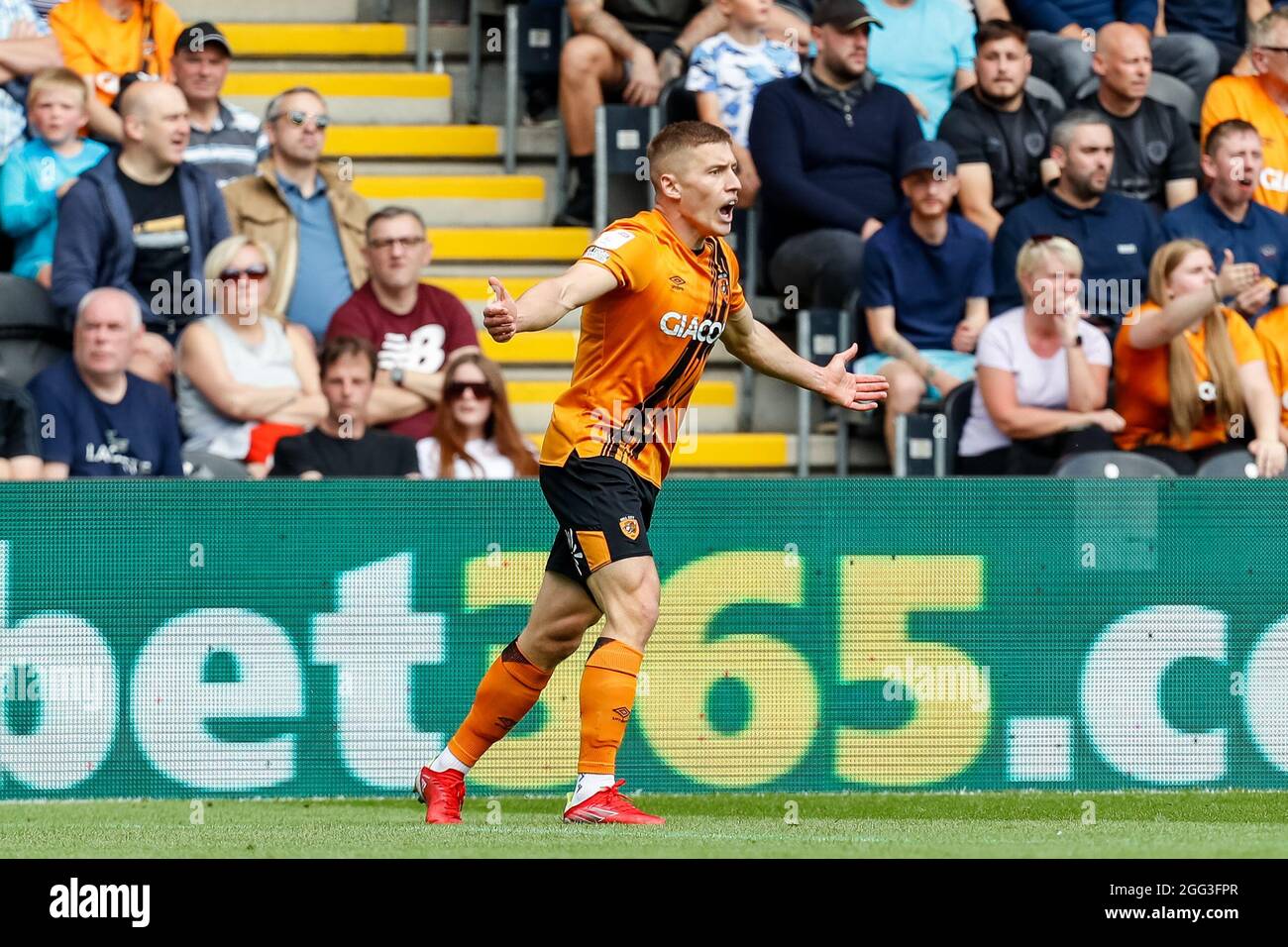 Geoff Docherty Hull, UK. 28th Aug, 2021. Greg Docherty #8 of Hull City complains to ...